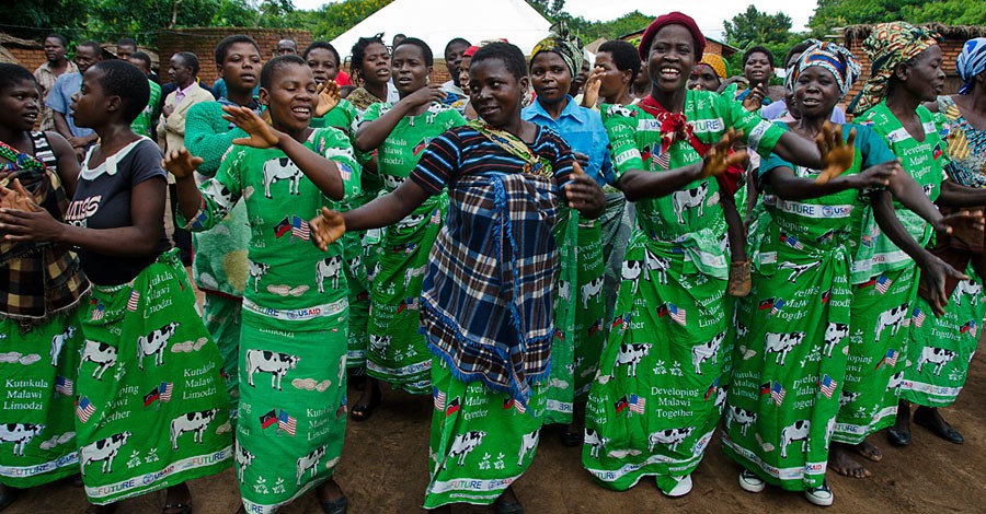 Women farmers welcome U.S. Ambassador to the United Nations Food and Agriculture Agencies in Rome David Lane to Tidi Village, Malawi, on January 14, 2013. [State Department photo by Sharon Ketchum/ Public Domain]