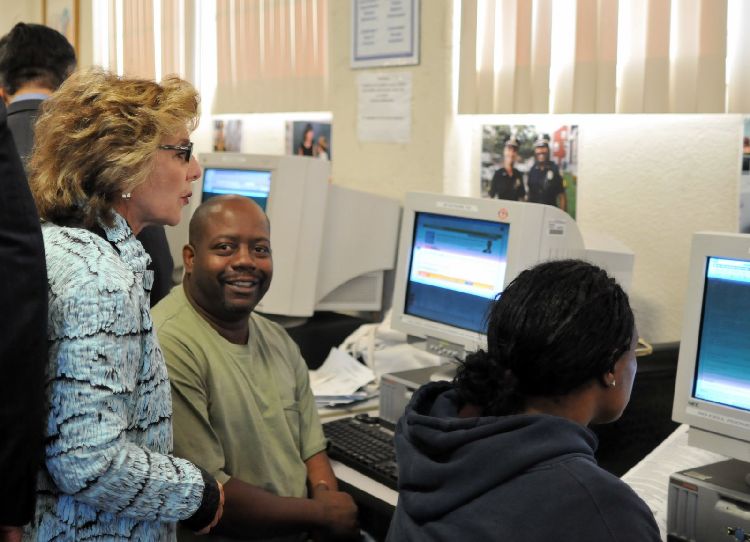 Senator Barbara Boxer speaks with South Los Angeles WorkSource Center visitors.