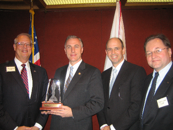 Congressman Murphy is presented with the National Association of Manufacturers Award for Manufacturing Legislative Excellence