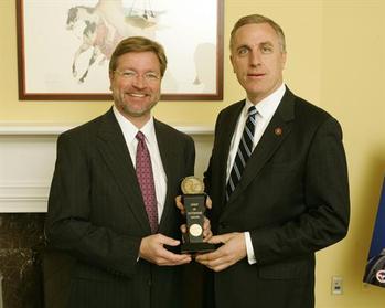 U.S. Chamber of Commerce Senior Vice President Rolf Lundberg, Jr. presents Congressman Murphy with the 