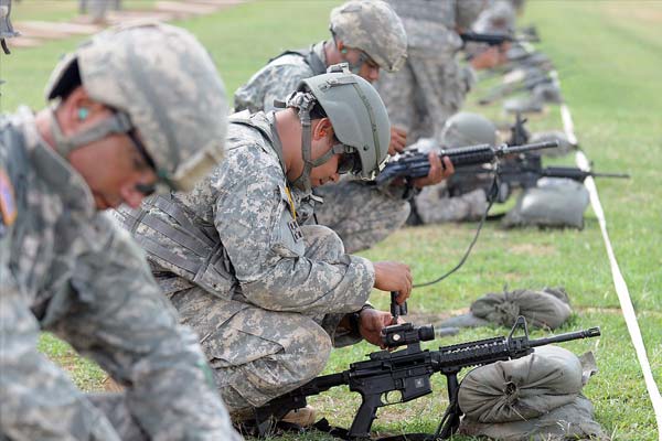 Members of the 130th Engineer Battalion, 101st Troop Command, Puerto Rico National Guard, conducted their annual weapons qualification training at Camp Santiago Joint Maneuver Training Center, Salinas, Puerto Rico. The Citizen-Soldiers conducted various training modules during drill weekend, to include the Humvee Egress Assistance Trainer (HEAT Training). (U.S. Army photo by Spc. Wilma Orozco Fanfan, 113th Mobile Public Affairs Detachment, 101st Troop Command, Puerto Rico Army National Guard)