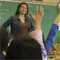 Teacher in classroom with students