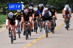 2012 Warrior Games Photo: Racers competing during the Bicycle Men Open 30K jockey for position at the first turn of the route. The category was for competitors who suffered from post traumatic stress syndrome, mild traumatic brain injury or spinal injuries.