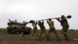 Binh sĩ Israel sau 1 cuộc diễn tập quân sự tại cao nguyên Golan, gần biên giới với Syria, 14/2/2013
