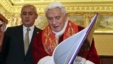 Pope Benedict XVI exchanges gifts with Guatemala's President Otto Perez Molina during a private audience at the Vatican February 16, 2013.