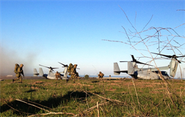 Members of the Japan Ground Self-Defense Force train alongside U.S. Marines with the MV-22B Osprey during the final key event of Exercise Iron Fist 2013 here, Feb 13. It marked the first time JGSDF troops with the Western Army Infantry Regiment trained with the Osprey aircraft. During the exercise, the 13th Marine Expeditionary Unit and JGSDF have been conducting bilateral training to improve their interoperability, enhance military-to-military relations, and sharpen skills essential to crisis response.