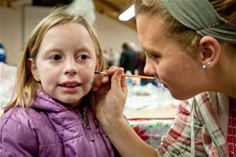 Holiday celebration draws children to the Air Guard