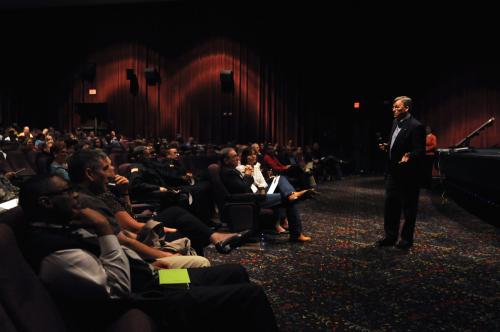 Andy Bird, Fort Hood Garrison deputy commander, briefs DA Civilians attending the Garrison Town Hall on the FY ‘13 budget Monday inside Palmer Theater.