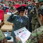 Sgt. Maj. Maryam Tabish, a senior enlisted leader at the Ministry of Interior's gender department, salutes Lt. Col. Mohammad Aziz Niazi, the Commandant of the Afghan National Army's Sergeants Major Academy before receiving her diploma at the graduation ceremony held Dec. 12, 2012, at the Kabul Military Training Center.  Tabish was one of two senior enlisted females to graduate the six month advanced education course, taught entirely by Afghan instructors, and designed to increase the roles, responsibilities, and capabilities on the ANSF noncommissioned officer corps.(U.S. Army Photo by Staff Sgt. Christopher Harper)