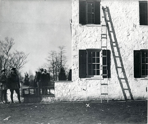 The ladder used to convict Bruno Hauptmann of kidnapping is seen here in a contemporary crime-scene photograph. Scientists at the Forest Products Laboratory were able to prove that one of the steps used in the ladder was from a plank of wood in Hauptmann’s attic. Forest Service photo.