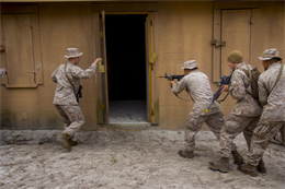 Marines of Company K, Battalion Landing Team (BLT) 3/2, currently reinforcing the 26th Marine Expeditionary Unit (MEU), practice clearing structures at Camp Lejeune, N.C., Oct. 10, 2012. BLT 3/2 is one of the three reinforcements of 26th MEU, which is slated to deploy in 2013.