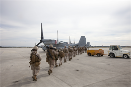 Marines with Weapons Company, Battalion Landing Team (BLT) 3/2, 26th Marine Expeditionary Unit (MEU), walk in a column in preparation to board an MV-22B Osprey at Marine Corps Air Station New River, N.C., Oct. 17, 2012. The Marines conducted a notional tactical recovery of aircraft and personnel mission in preparation for an upcoming deployment. The 26th MEU is slated to deploy in 2013.