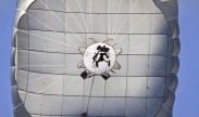 Photo: A paratrooper with the 82nd Airborne Division’s 1st Brigade Combat Team descends to a drop zone on Fort Bragg, N.C., Jan. 29, 2013, using the Army’s new T-11 parachute system. U.S. Army photo by Sgt. Michael J. MacLeod