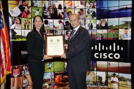 U.S. Ambassador Michele J. Sison presents Fadi Moubarak, Cisco Systems' General Manager for the Levant Region with a certificate for being a finalist for the Department of State's Award for Corporate Excellence in 2009...