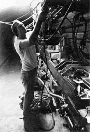 Bruce Kling purges the pneumatic control system in the Main Ring tunnel