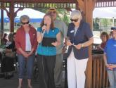 three women announce opening of computer center