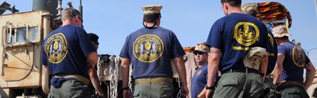 U.S. Navy divers assigned to Mobile Diving and Salvage Unit (MDSU). 

