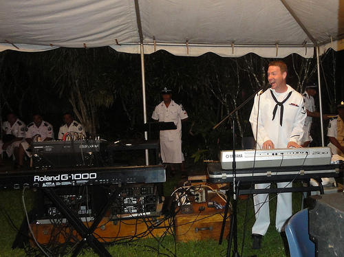 Naval keyboard specialist entertains guests at the official State Dinner, held at the historic Robert Louis Stevenson House.