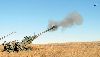 Gun One, occupied by a gun line with the 2nd Pltn., Btry. A, 2nd Bn., 32nd FA Regt., has smoke bellowing from the tube after firing a 155mm M777 Ultra Lightweight Howitzer during a live-fire exercise Jan. 23 at Training Area 52, Fort Riley. The 2nd Bn., 32nd FA Regt. is the first battalion in the 1st Inf. Div. to fire the M777.