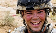 A U.S. soldier smiles during a brief break. Photo by U.S. Army Staff Sgt. Chad D. Nelson