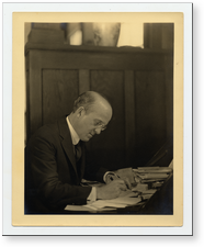 [Avery at his desk]. [ca. 1920].