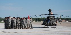 Soldiers+of+E+Troop+of+the+1st+Squadron%2c+6th+Cavalry+Regiment%2c+Combat+Aviation+Brigade%2c+stand+in+formation+next+to+an+OH-58+Kiowa+Warrior+helicopter+July+1+on+Marshall+Army+Airfield+during+an+uncasing+ceremony.+(Photo+by+Jordan+Chapman%2c+1st+Inf.+Div.+Public+Affairs)+%0d%0a