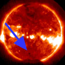 X-ray image of the Sun made by the  GOES-12 satellite.  Arrow points to Venus passing in front of the Sun.