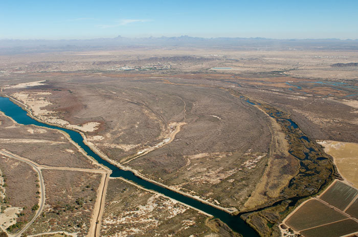 Aerial view of the Laguna Division Conservation Area looking northeast with the Laguna Settling Basin (left) and the Mittry Lake Wildlife Area (right) - Photo by Reclamation