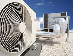 Photo of a rooftop air conditioning unit on an office building.