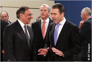 Defense Secretary Panetta and NATO Secretary-General Rasmussen, with others in background ( AP Images)