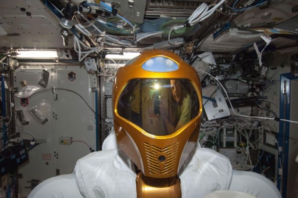 Here's A close-up photo of Robonaut 2 - R2, the first dexterous humanoid robot in space that was taken inside the International Space Station's Destiny laboratory. By the way you can see the reflections of NASA astronaut Kevin Ford on R2's helmet visor. (Photo: NASA)
