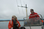 Sea-otter researchers Michelle Staedler (left) of Monterey Bay Aquarium and Tim Tinker of the USGS work together to locate sea otters for their study of sea-otter diet and behavior. Photograph by Tania Larson, USGS. 