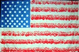 Flag painted on wall with hand prints