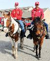 Chief Warrant Officer-2 Dean Barefield and Sgt. 1st Class Cesar Robles, the CGMCG commander and senior NCO, prepare to embark on a staff ride with members of the unit and their Families Jan. 9 at Fort Riley.  Photo by: Amanda Kim Stairrett, 1ST INF. DIV.