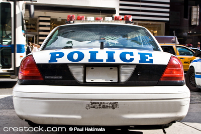 The rear of a parked New York City Police car.