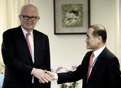 Stephen W. Bosworth, the U.S. special envoy on North Korea, left, shakes hands with his South Korean counterpart Wi Sung-lac during their meeting at the Foreign Ministry in Seoul, South Korea, Monday, March 9, 2009.