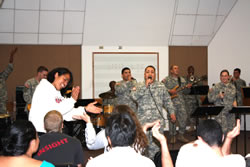 The MEDCOM band's latin group 'Fuerza Latina' entertains music students at Brigham Young University during performances in Hawaii