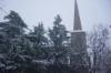 Snowy scene with church in downtown Raleigh