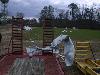 Debris blown across the NC State Ag Farm adjacent to the NWS Doppler Radar near Clayton - Click to enlarge