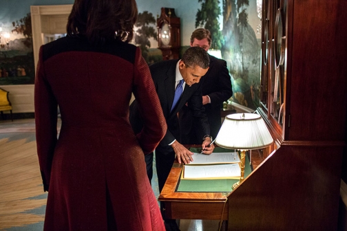 President Obama signs copies of his State of the Union address
