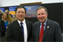 Dr. Jiang Liu greets Congressman Doug Lamborn (R-CO).