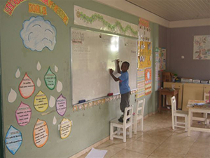 Ghanian Child at the Whiteboard in School