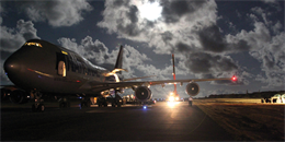 A Boeing 747-400 aircraft is unloaded at Tinian International Airport, Northern Mariana Islands, Nov. 28 during Exercise Forager Fury 2012. The aircraft was the first 747 to land on Tinian and brought equipment vital for Marine Aircraft Group 12’s execution of Forager Fury. The historic landing marked the beginning of the exercise, which is scheduled to be conducted through Dec. 19. MAG-12 is part of 1st Marine Aircraft Wing, III Marine Expeditionary Force. 