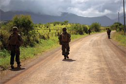 U.S. Marines patrol during Exercise Croix du Sud at Camp la Broche New Caledonia, Oct. 13. While on patrol, the platoon of Marines engaged the enemy multiple times and found one improvised explosive device. The Marines also cleared a farm compound of simulated enemy forces during a multilateral, company-level attack.  