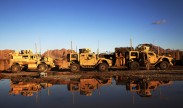 Photo: A Marine with Fox Company, 2nd Battalion, 7th Marine Regiment (2/7), inspects his vehicle on Forward Operating Base Now Zad, Helmand province, Afghanistan, Dec. 17, 2012. The Marines of 2/7 are currently deployed to Afghanistan in support of Operation Enduring Freedom. (U.S. Marine Corps photo by Cpl. Alejandro Pena)