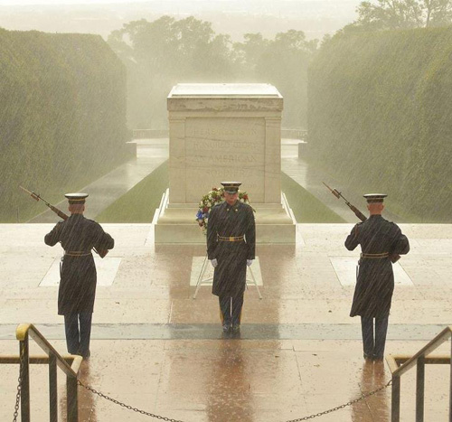 U.S. soldiers guard the Tomb of the Unknowns during Hurricane Sandy.