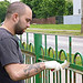 USS Bobo Sailors Paint a School Fence, June 27, 2012