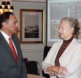 Debra Erb, Managing Director of Housing Project Finance at OPIC, with Yaseen Anwar, Acting Governor of the Pakistan state bank