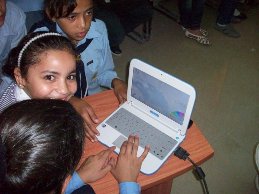 Three Kids in Egypt School with Laptop