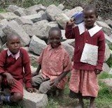 Three Children in School Uniform Smiling